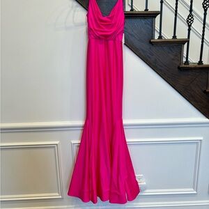 Brand New Magenta Prom Dress. Brand new with tags. Pet and smoke free home.